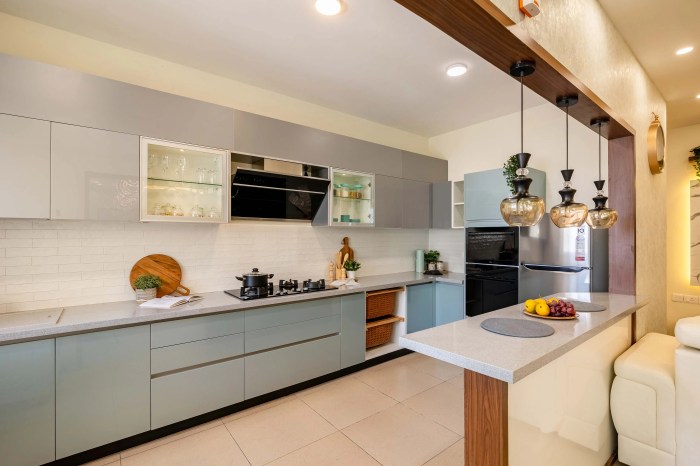 Spacious Kitchen Design With Wall Storage | Livspace